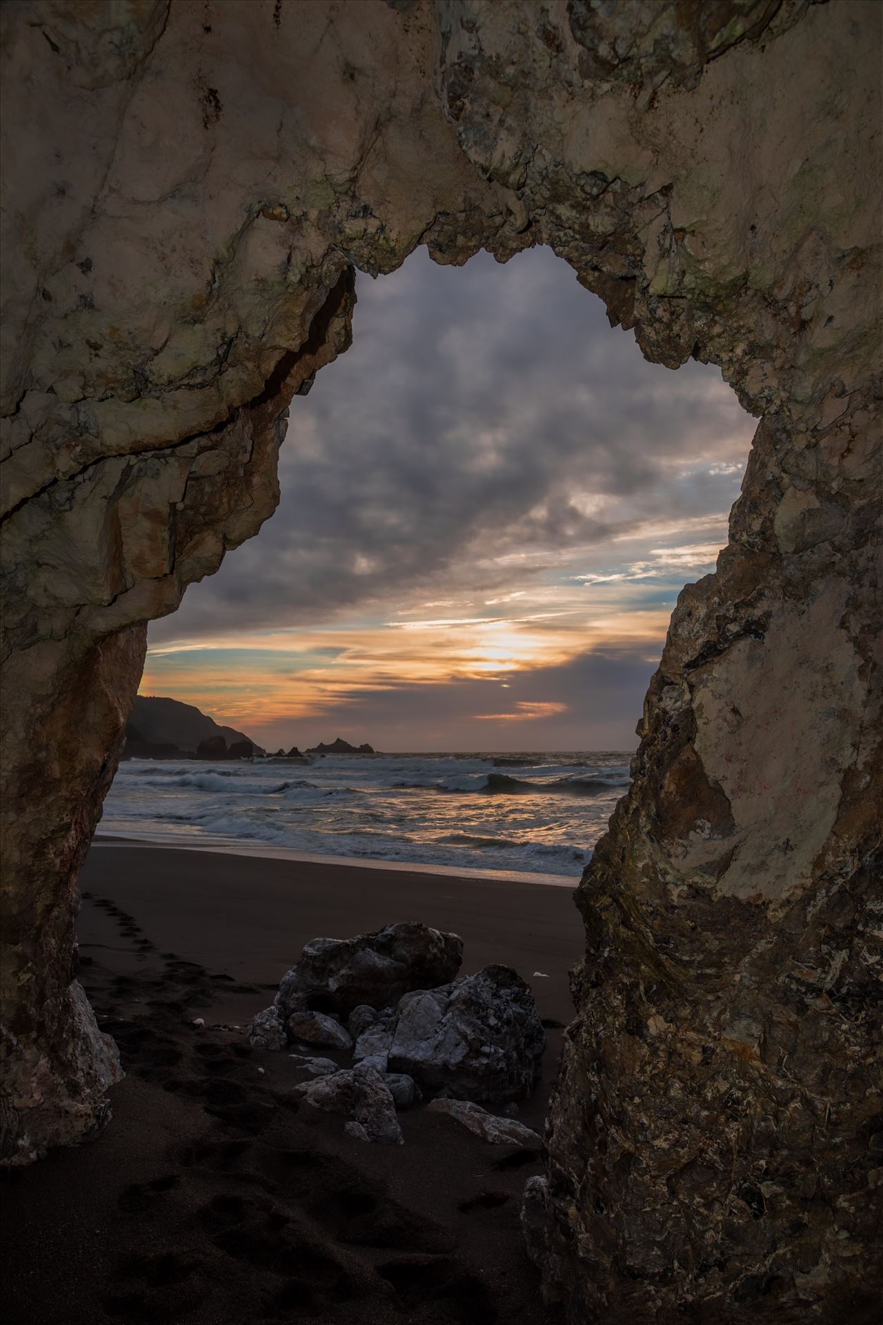 Inside Looking Out - View over the ocean toward Pedro Point in Pacifica, CA from a cave at Rockaway Beach. by Denise Buckley Crawford
